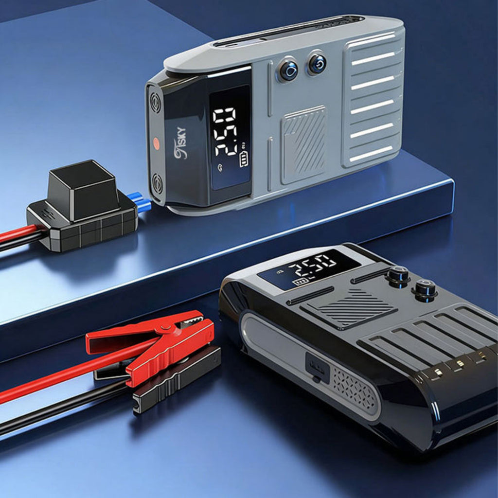 Two battery testers on a blue surface with cables and connectors.