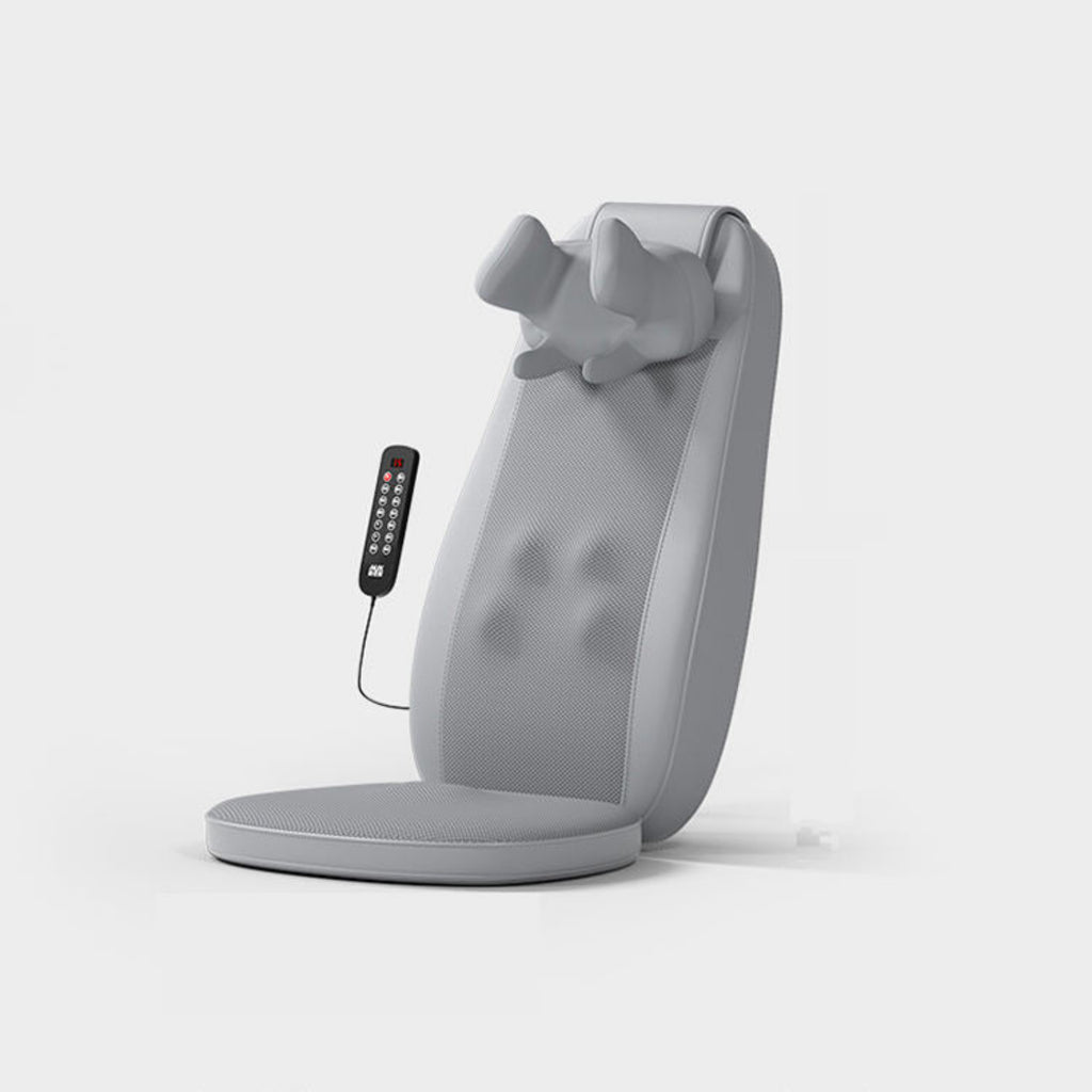 Gray massage chair with remote control on a white background