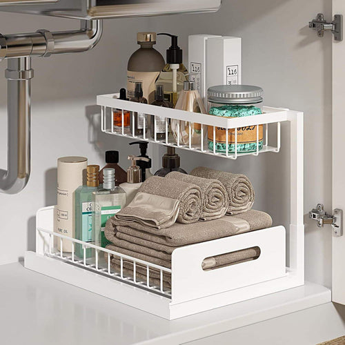 White under-cabinet organizer with towels and toiletries in a bathroom setting